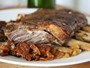 Braised lamb ribs with apricots and onions