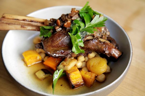 Braised lamb shank with garbanzo bean salad