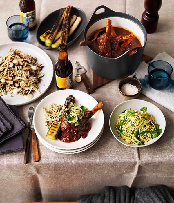 Braised lamb shanks, burnt leeks and zucchini salad
