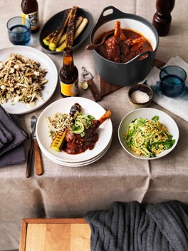 Braised lamb shanks, burnt leeks and zucchini salad