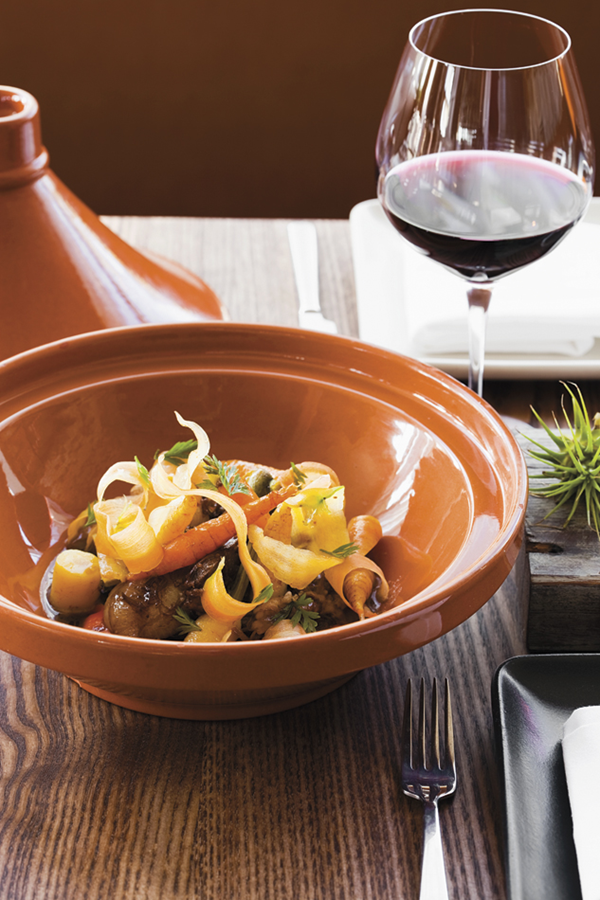 Braised lamb shanks with carrots, allium & Firelit coffee liqueur