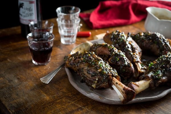 Braised lamb shanks with fresh herbs 