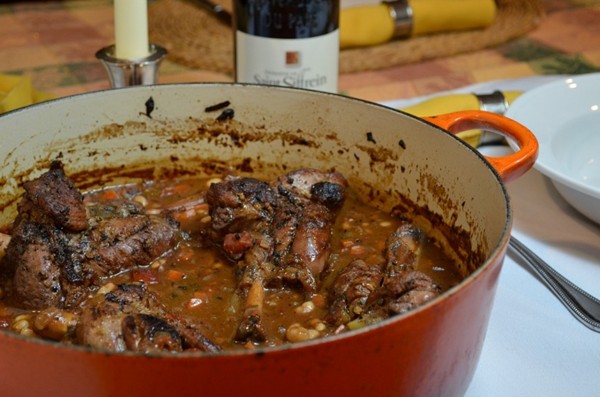 Braised lamb shanks with tomatoes and white beans