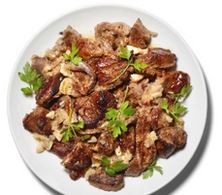 Braised lamb with anchovies, garlic and white wine