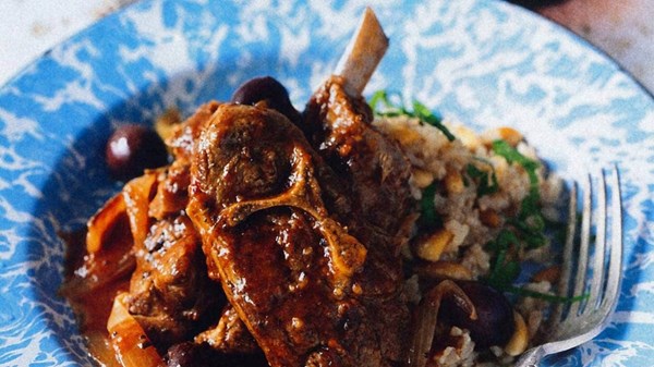 Braised lamb with cinnamon and olives and nut pilaf
