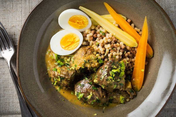 Braised lamb with egg and lemon
