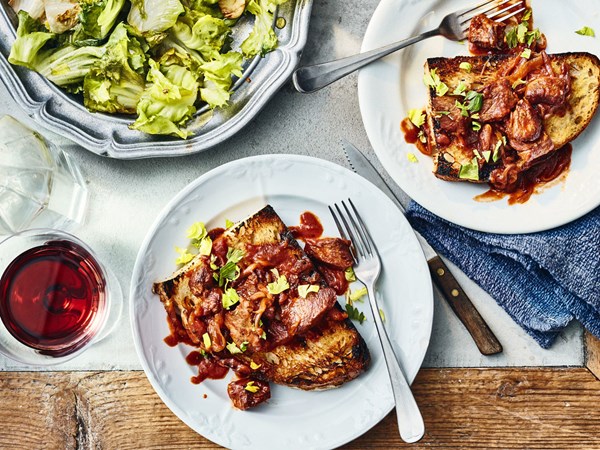 Braised lamb with garlic, wine, and lovage