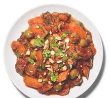 Braised lamb with tomatoes and almonds