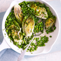 Braised little gems and peas with summer herbs and shallots