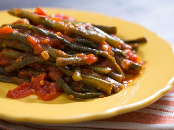 Braised long beans with tomatoes, garlic, and mint
