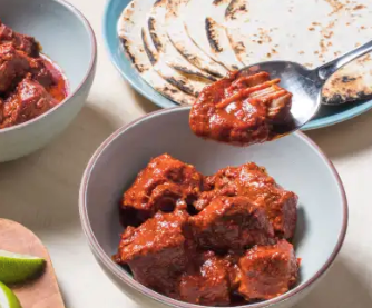 Braised New Mexico-style pork in red chile sauce (Carne adovada)