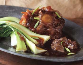 Braised oxtails with star anise and Chinese greens
