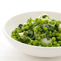 Braised peas, rocket and spring onions