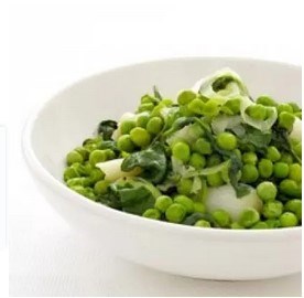 Braised peas, rocket and spring onions