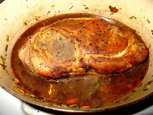 Braised pork shoulder with garlic and thyme