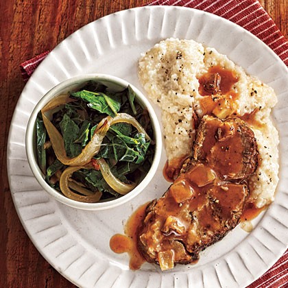 Braised pork with slow-cooked collards, grits, and tomato gravy