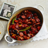 Braised pork with tomatoes, chorizo, thyme and black olives