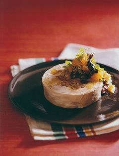 Braised rabbit with black olives and oranges