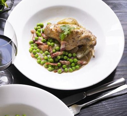 Braised rabbit with grain mustard sauce, Jersey Royals, peas and bacon