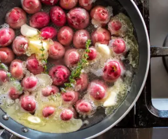 Braised red potatoes with lemon and chives