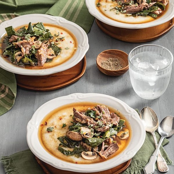 Braised short ribs with collard greens and cheese grits