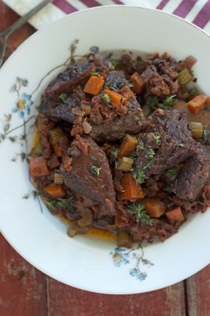 Braised short ribs with sun-dried tomatoes and herbs