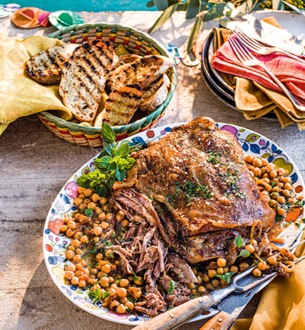 Braised shoulder of lamb with chickpeas, onions, garlic and oregano [José Pizarro]
