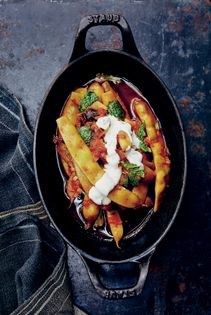 Braised spiced Romano beans with yogurt & mint