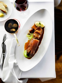 Braised stuffed pig's trotters with cabbage, shallots and potato purée 