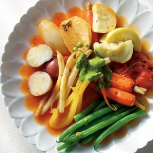 Braised summer vegetables with green herb sauce