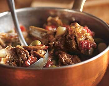 Braised veal breast with herbs, Pernod, and tomatoes