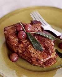 Braised veal chops with honey and red grapes