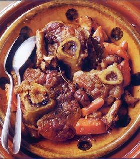 Braised veal shanks with chanterelles, carrots, chestnuts, and lardons
