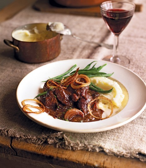 Braised venison with prunes, Port and crispy onions