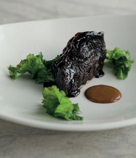 Braised wagyu beef cheek with burnt onion 'mayonnaise' and kale