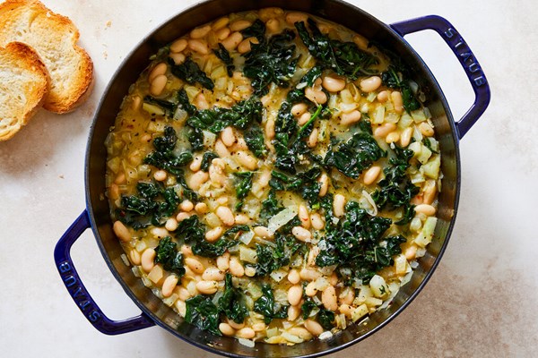 Braised white beans and greens with Parmesan [Lidey Heuck]