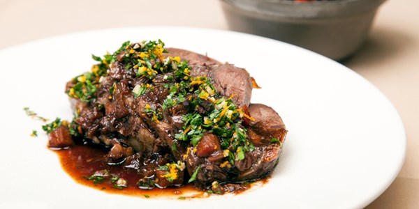 Braised whole beef shin with gremolata