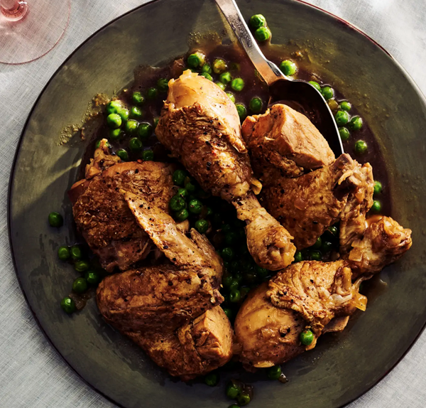 Brandy-braised chicken with peas (Pitu caleya) [Teresa Camacho]