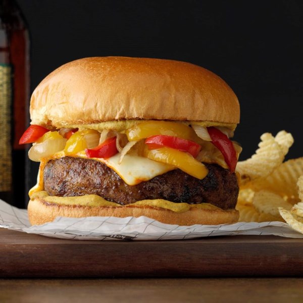 Bratwurst burgers with braised onions