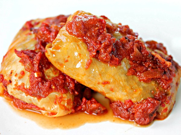 Bratwurst-stuffed cabbage rolls with smoky bacon-tomato sauce