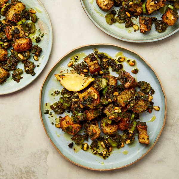 Bread salad with kale, pine nuts and roast lemon