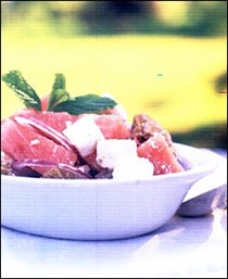 Bread salad with watermelon, feta, and red onion