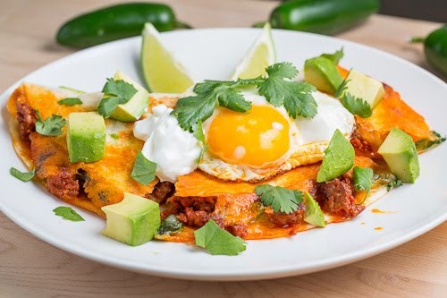 Breakfast chorizo quesadilla topped with a fried egg