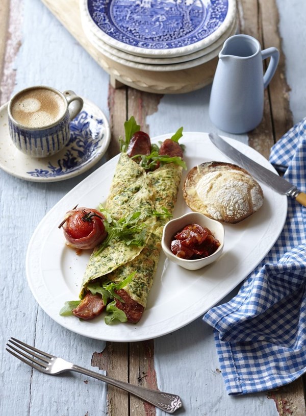 Breakfast omelettes with chorizo, rocket and bacon-wrapped tomatoes