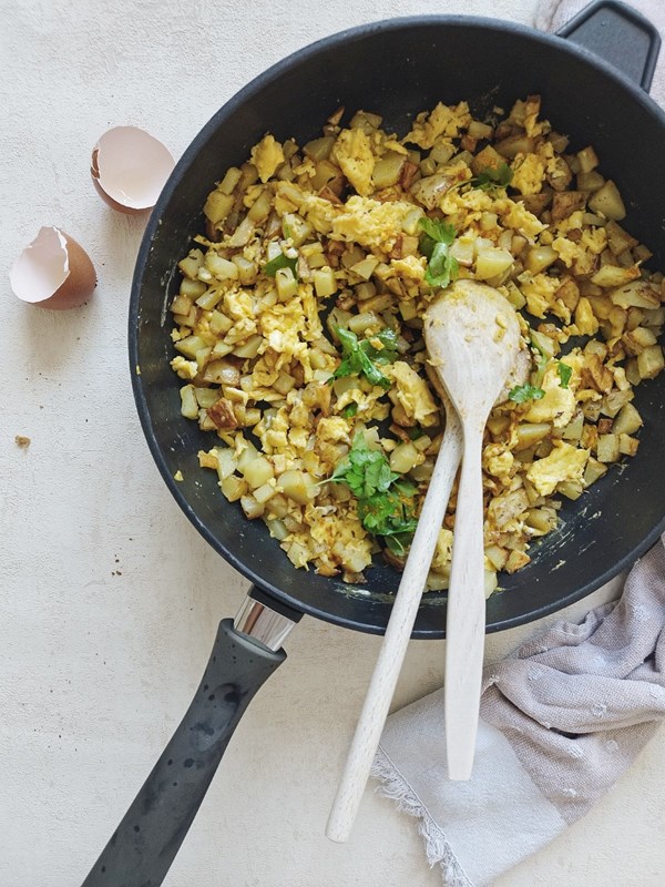 Breakfast potatoes with scrambled eggs