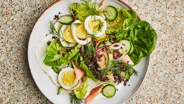 Breakfast salad with smoked trout and quinoa