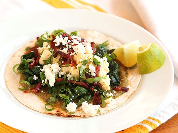 Breakfast tacos with eggs, spinach, and bacon