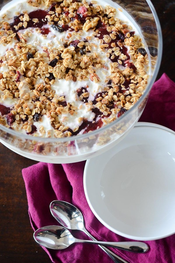 Breakfast yogurt parfait with granola and jam
