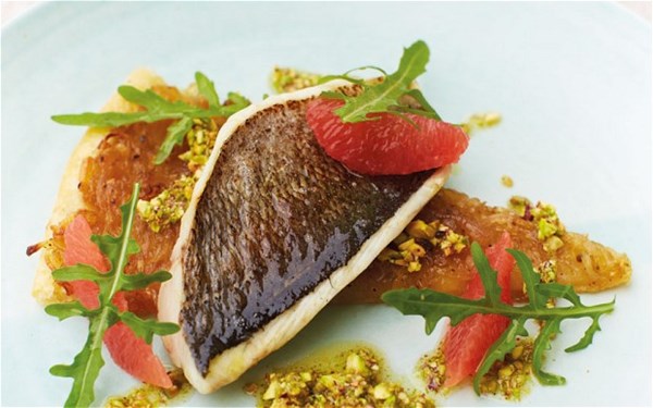 Bream with chicory tart, pink grapefruit and pistachio dressing