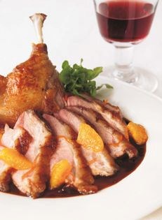 Breast of duckling with braised leg, orange sauce (Suprêmes de caneton sautée et cuisse braisée à l’orange)